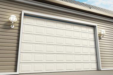 White raised-panel garage door with wall lanterns on either side