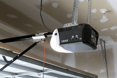 1/2 HP garage door opener motor mounted on the ceiling